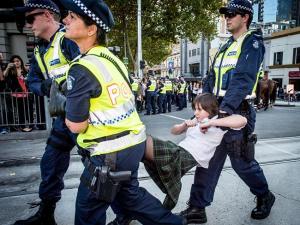 The fifteen year old student is carried away by police