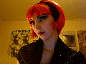 Me playing drag queen at home in my 20s